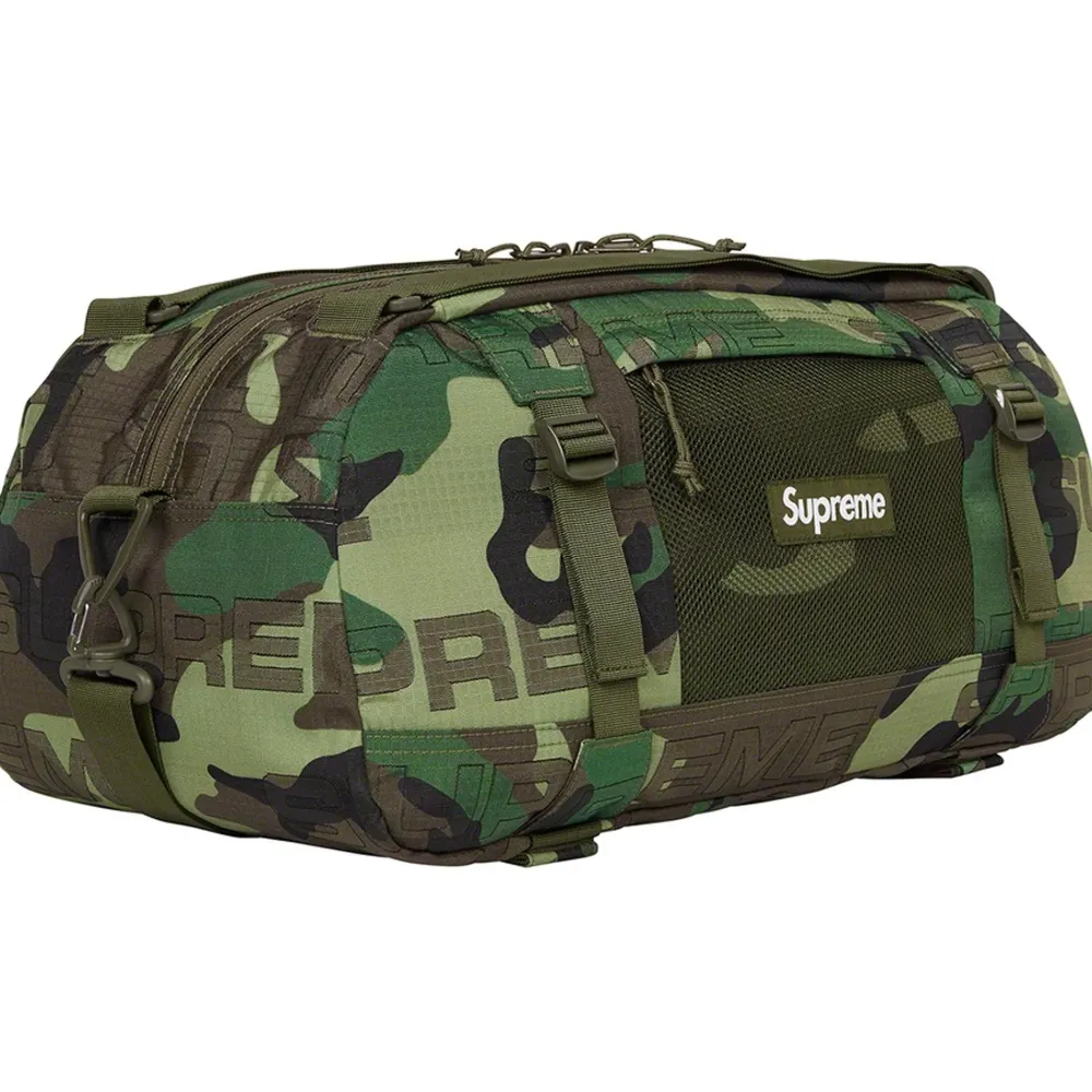 Supreme Duffle Bag (FW21) Woodland Camo ||Plus Online
